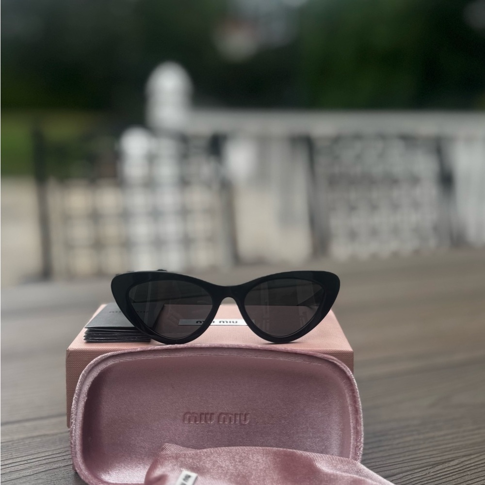 Miu Miu Black Cat-Eye Sunglasses with Pink Case